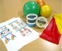 ボールやゴムバンドなどのリハビリ用具とホームエクササイズの資料